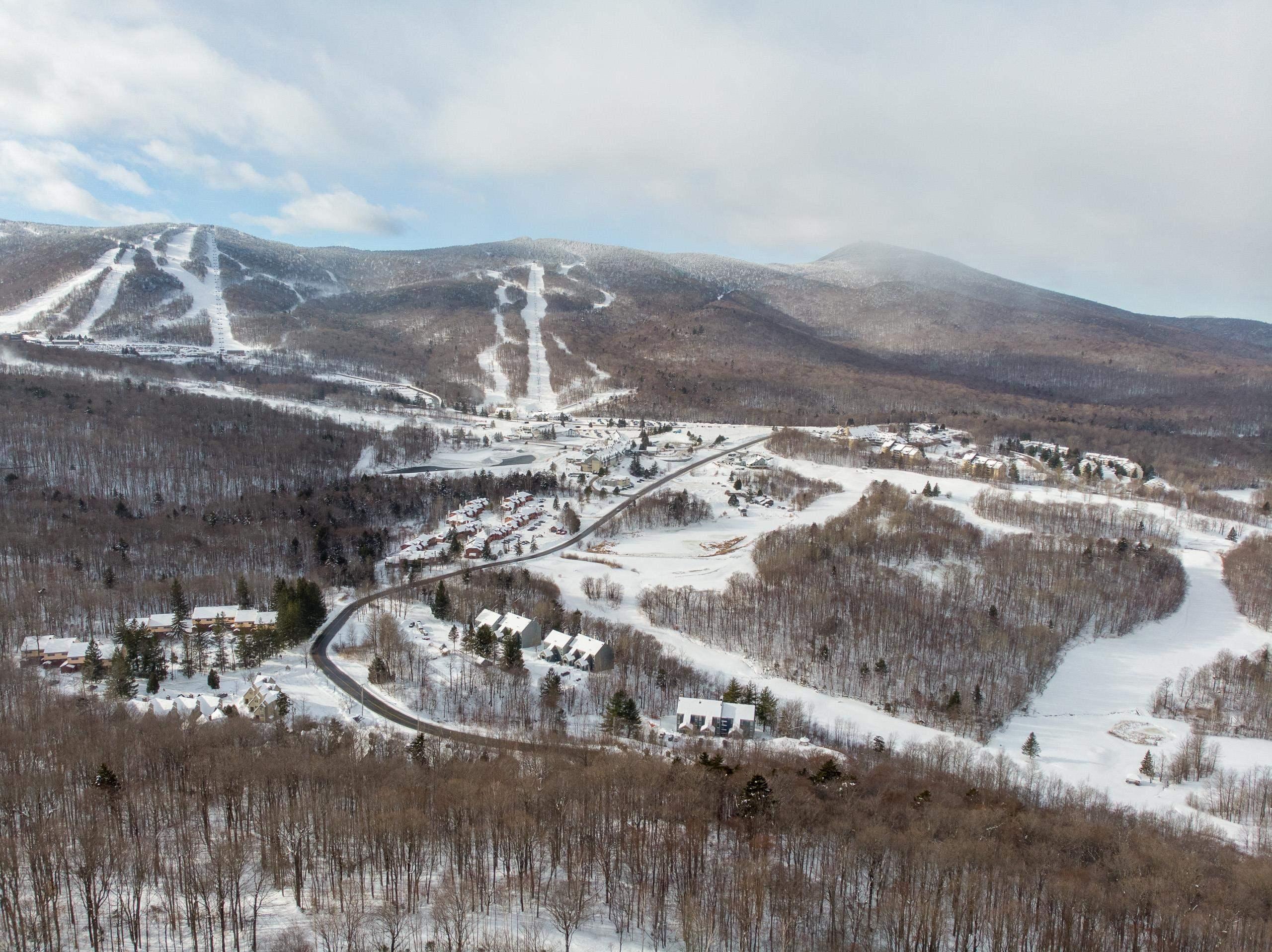 Image 4: Aerial drone shot above lot