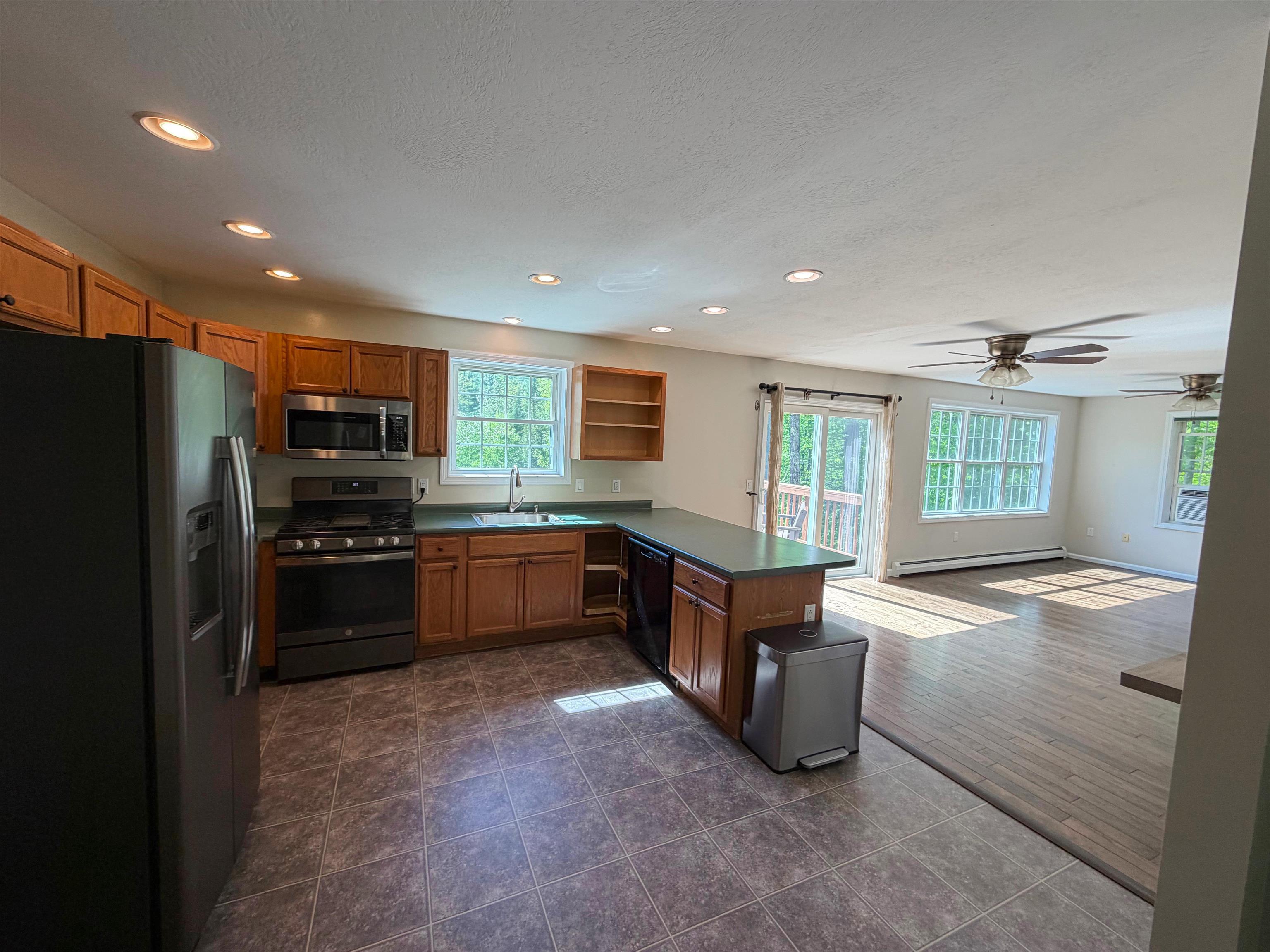 Image 2: Open Kitchen Area into Living Room Image 2: Open Kitchen Area into Living Room