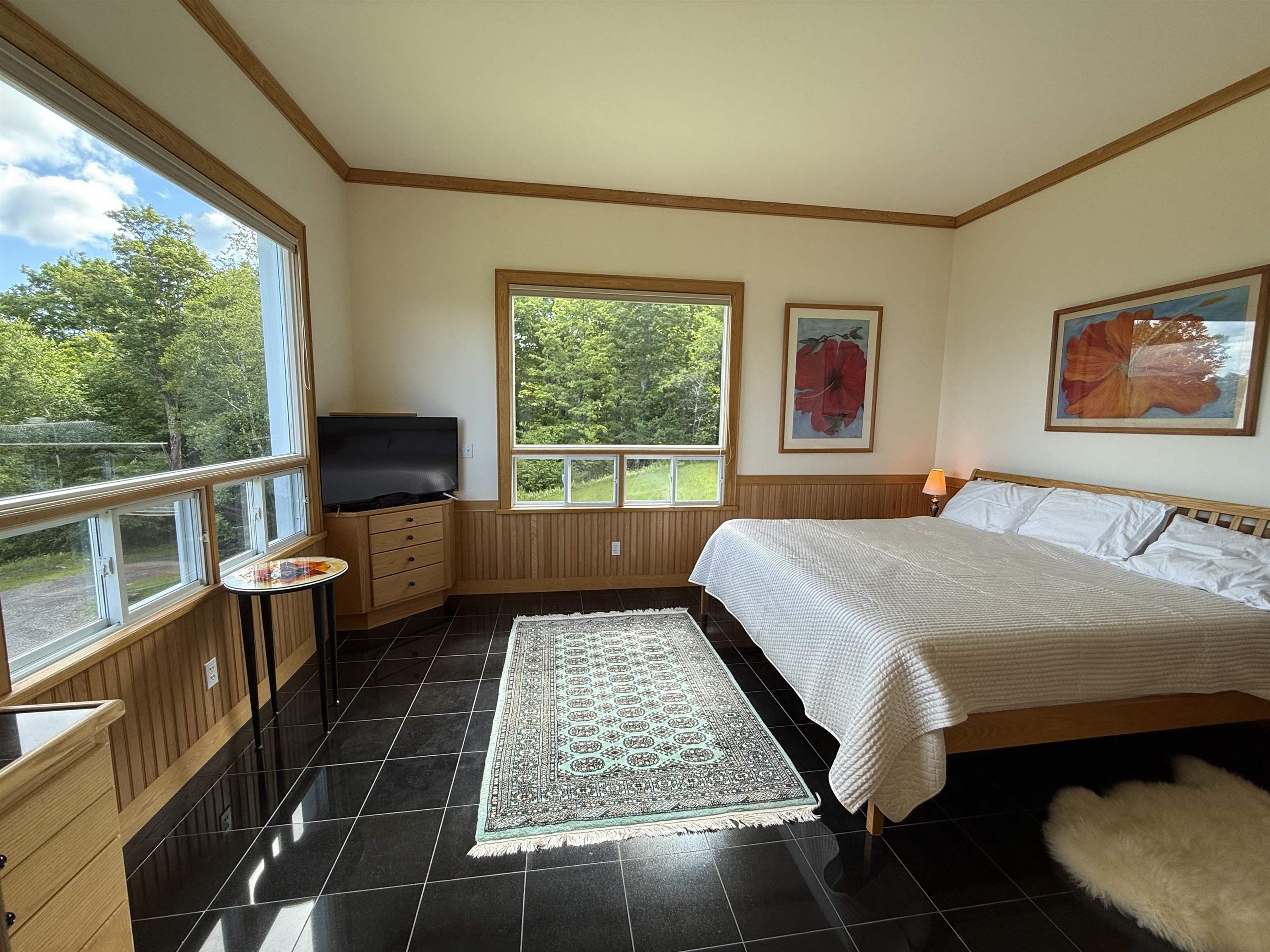 Image 4: PRIMARY BEDROOM ON MAIN FLOOR