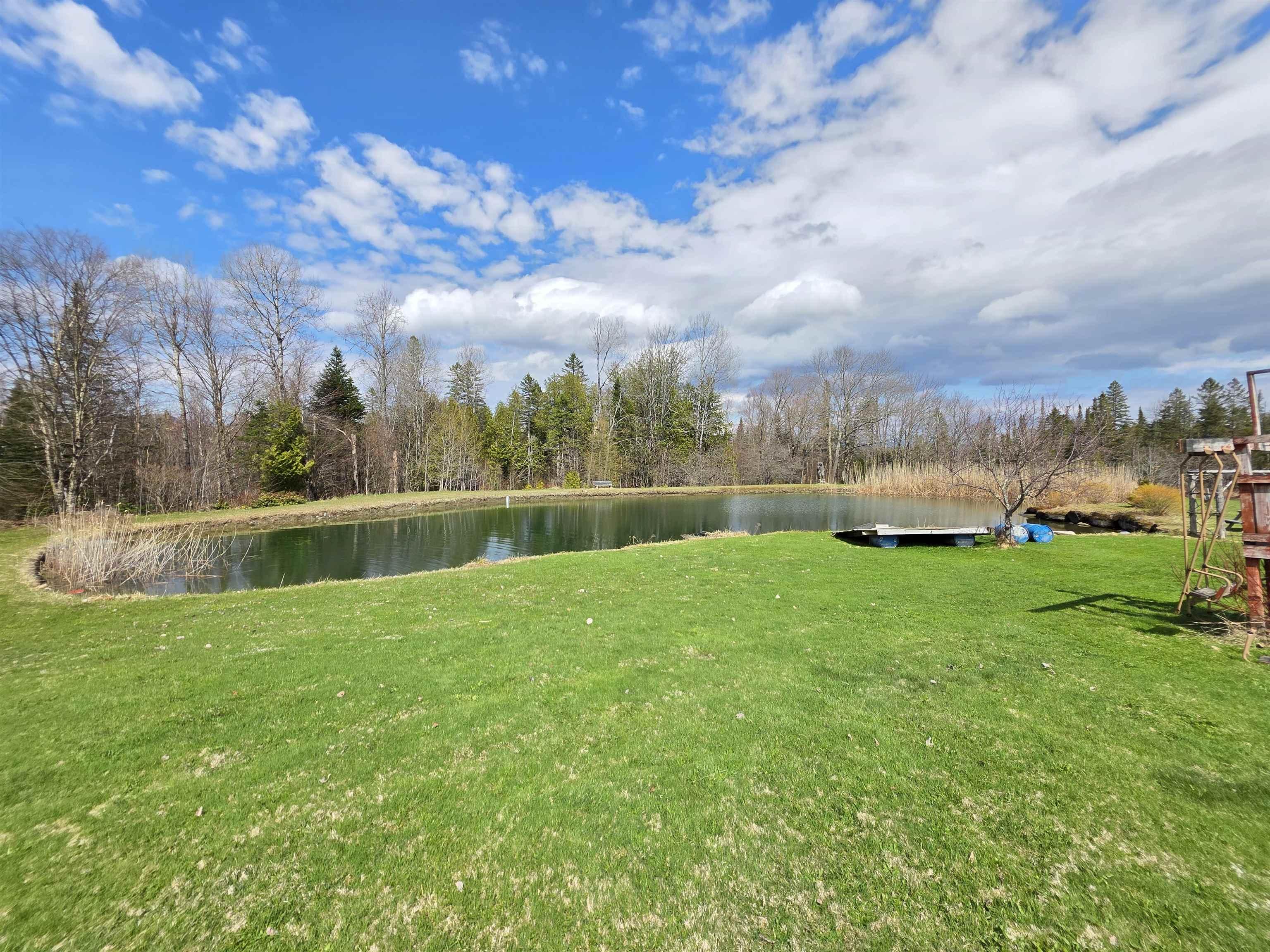 Image 2: Big private pond for swimming and yes, there are fish in it!