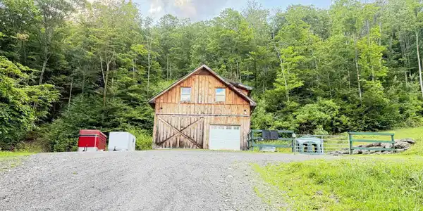 Image 2: HORSE BARN AND GARAGE