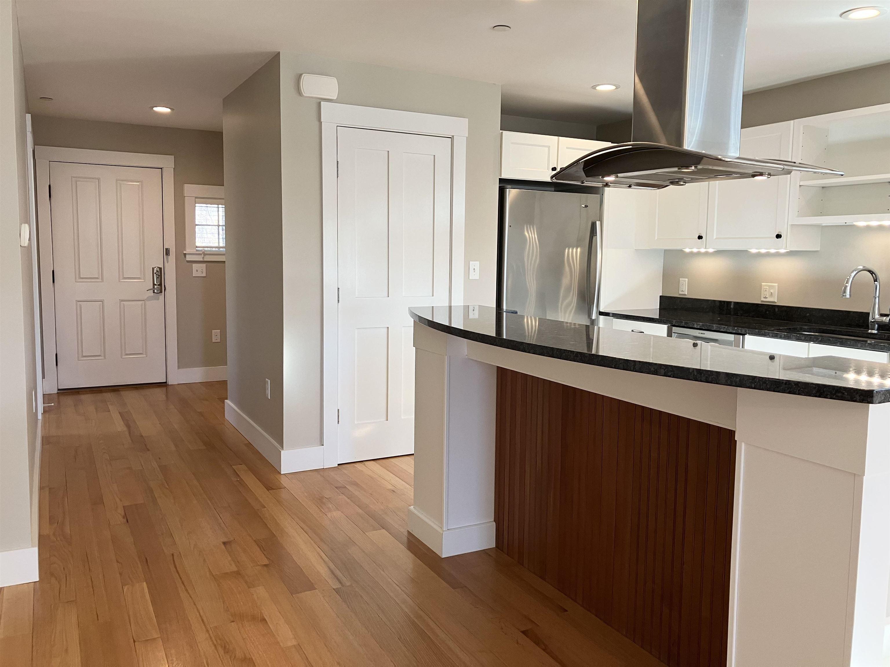 Image 1: Large center island kitchen with raised counter seating Image 1: Large center island kitchen with raised counter seating