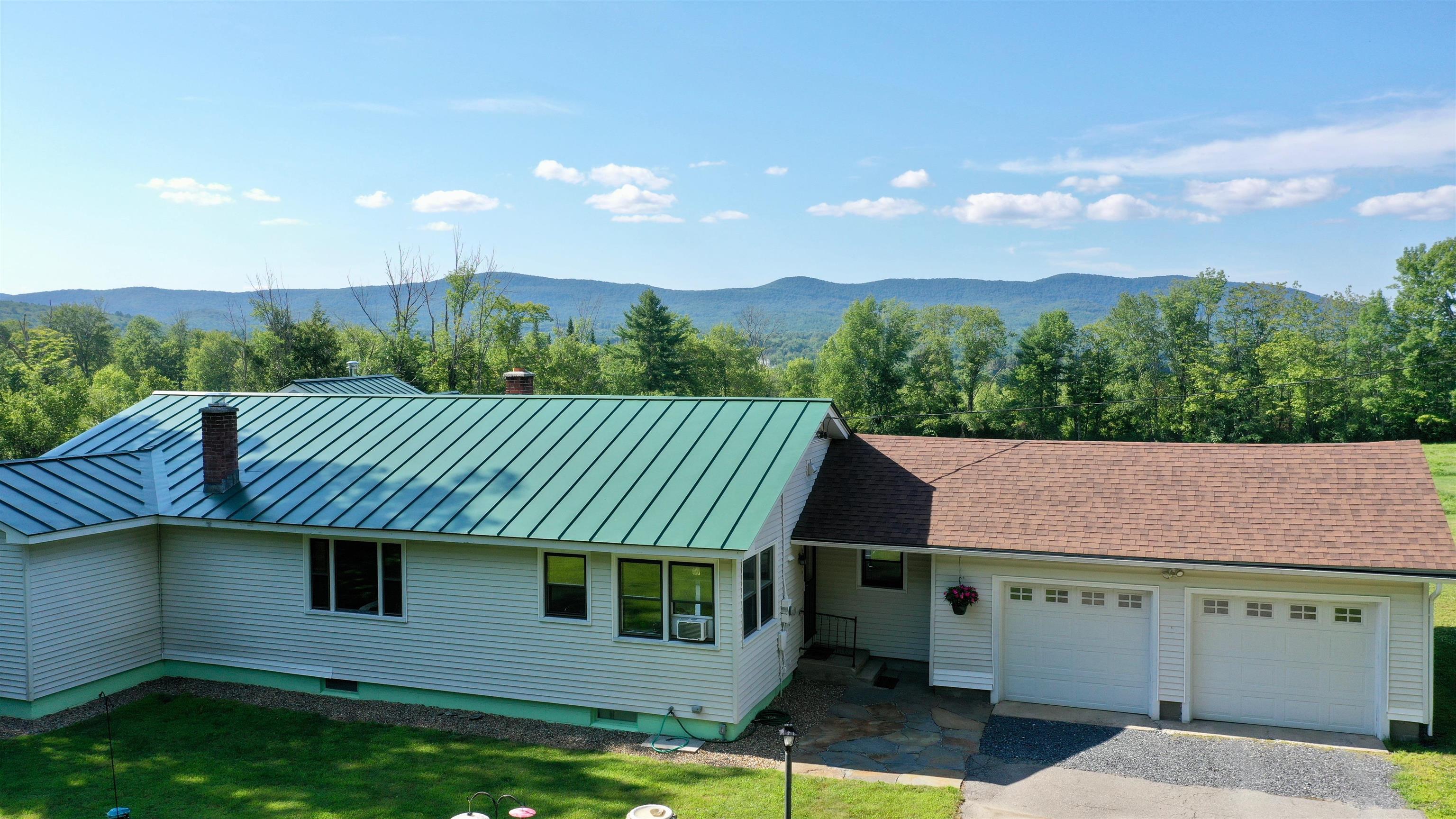 Image 3: south side of house and garage