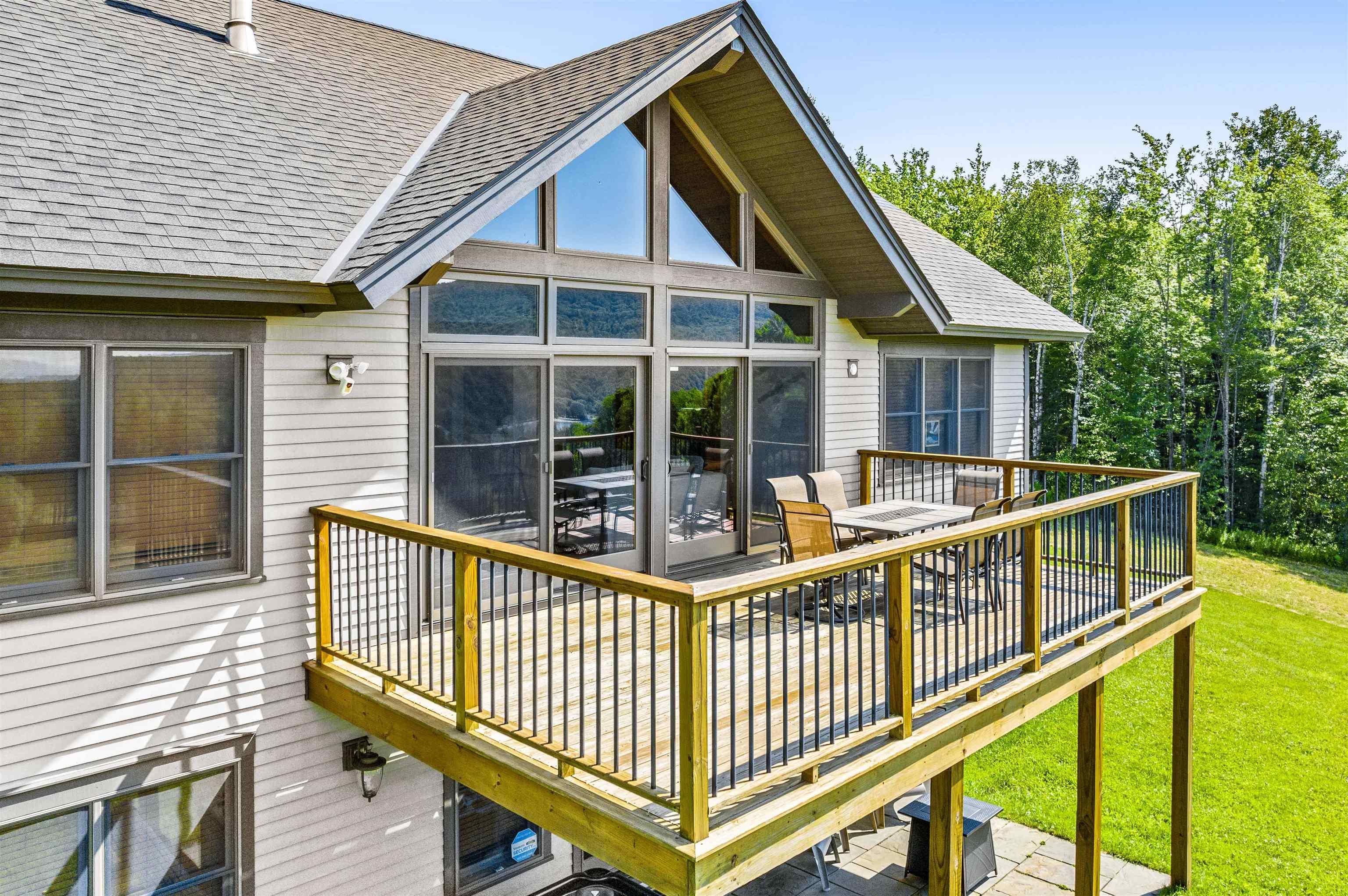Image 3: Large Livingroom Deck w Elmore Mtn and Lake Elmore View Image 3: Large Livingroom Deck w Elmore Mtn and Lake Elmore View