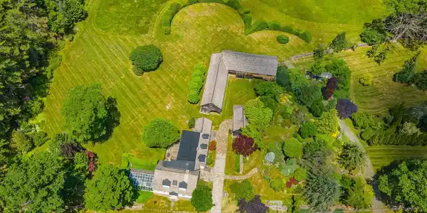 Image 3: Aerial of buildings & house