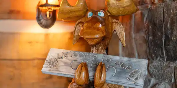 Image 4: Welcoming wooden moose