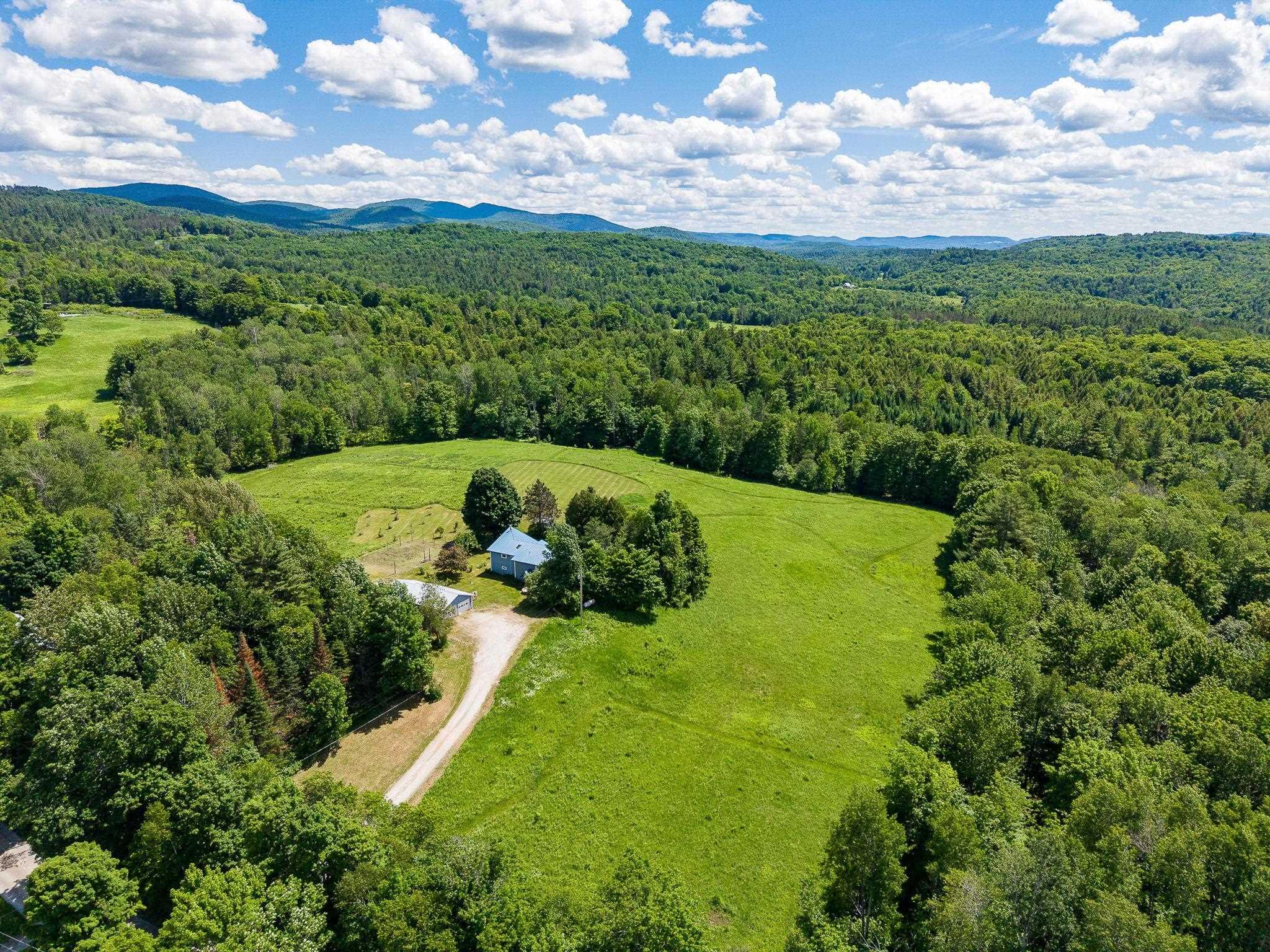 Image 2: Expansive cleared land, a homesteader's dream