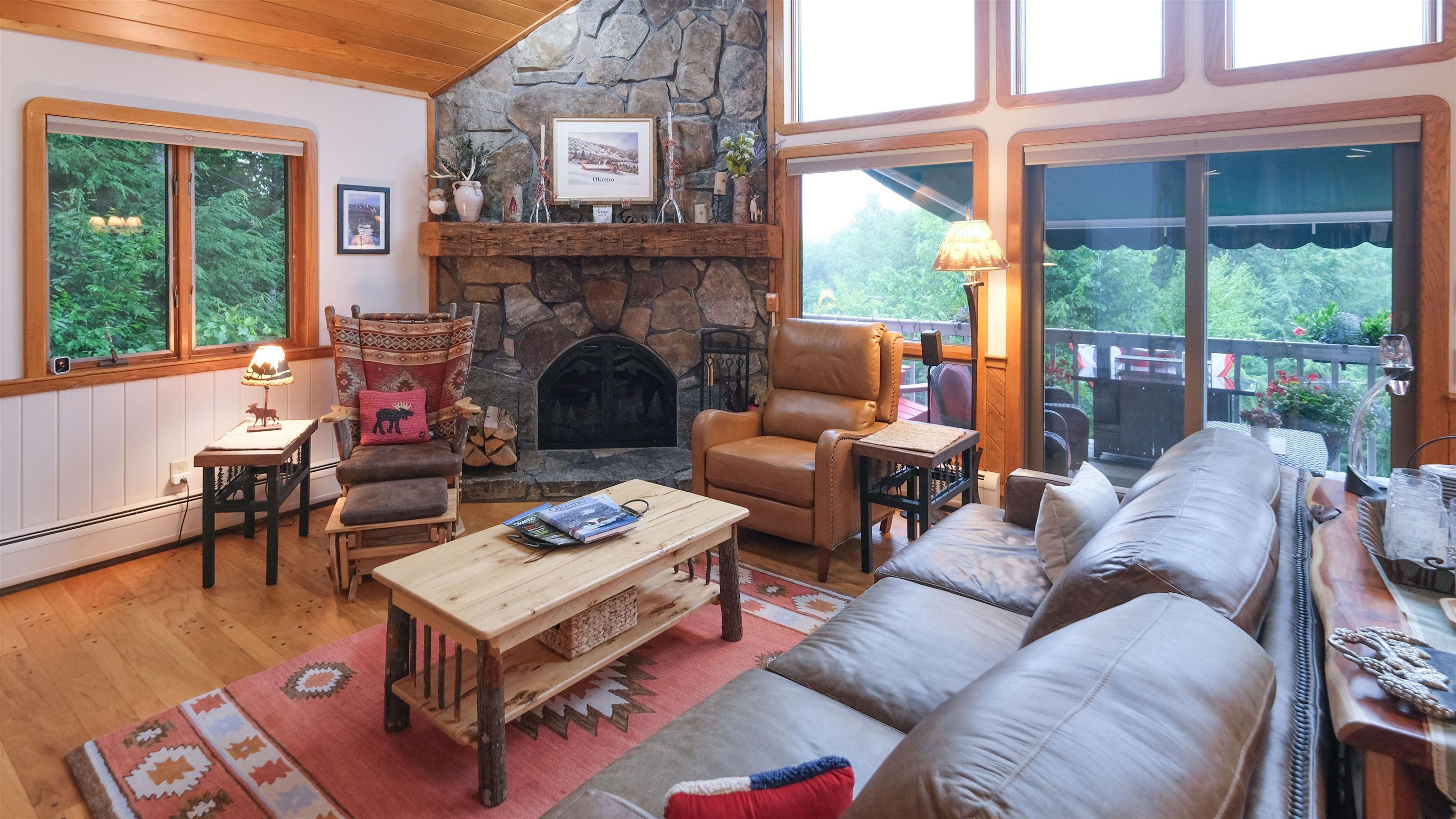 Image 2: Living room with wood burning fireplace Image 2: Living room with wood burning fireplace
