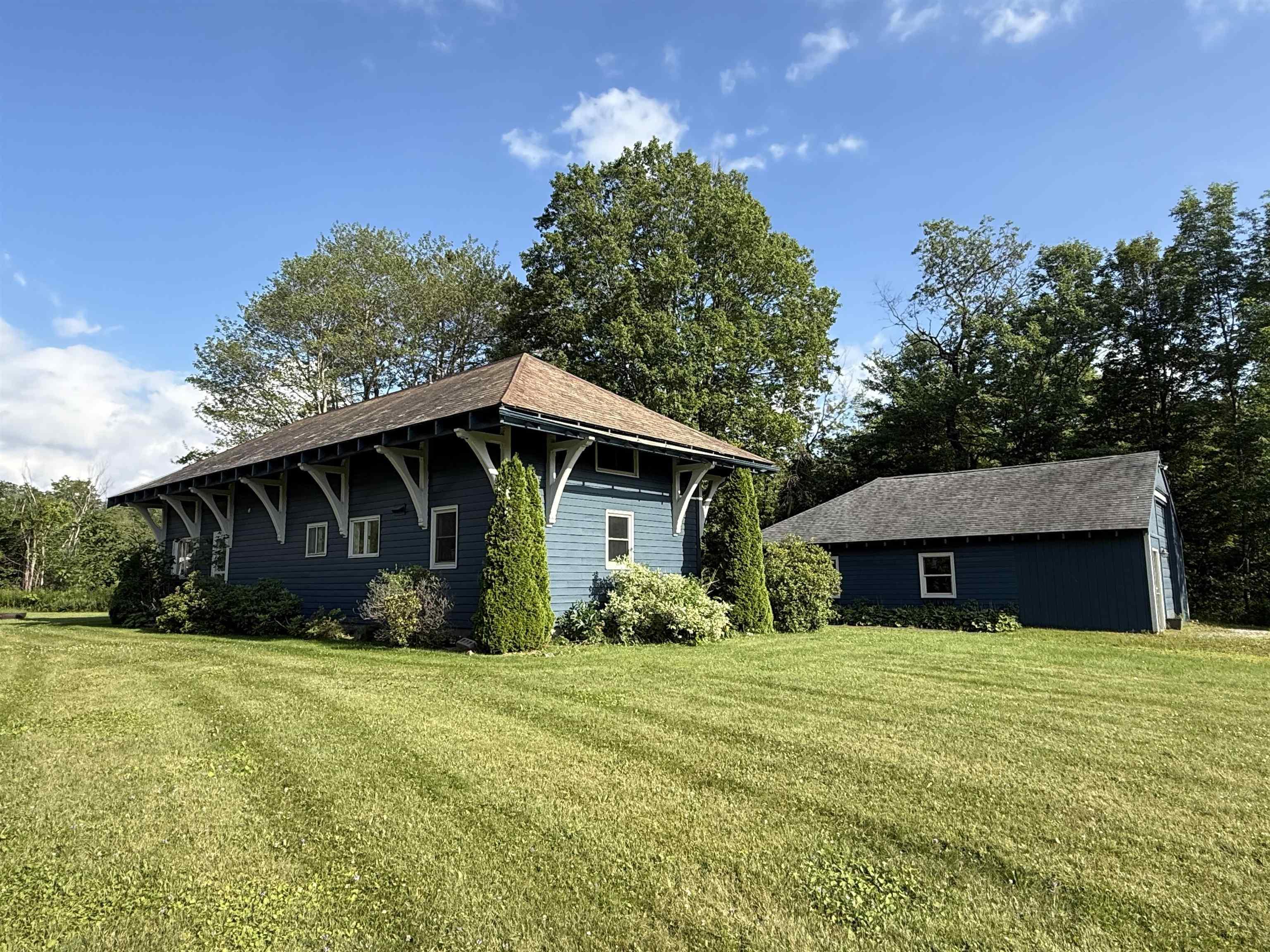 Image 1: Station House and Commercial Building/Garage