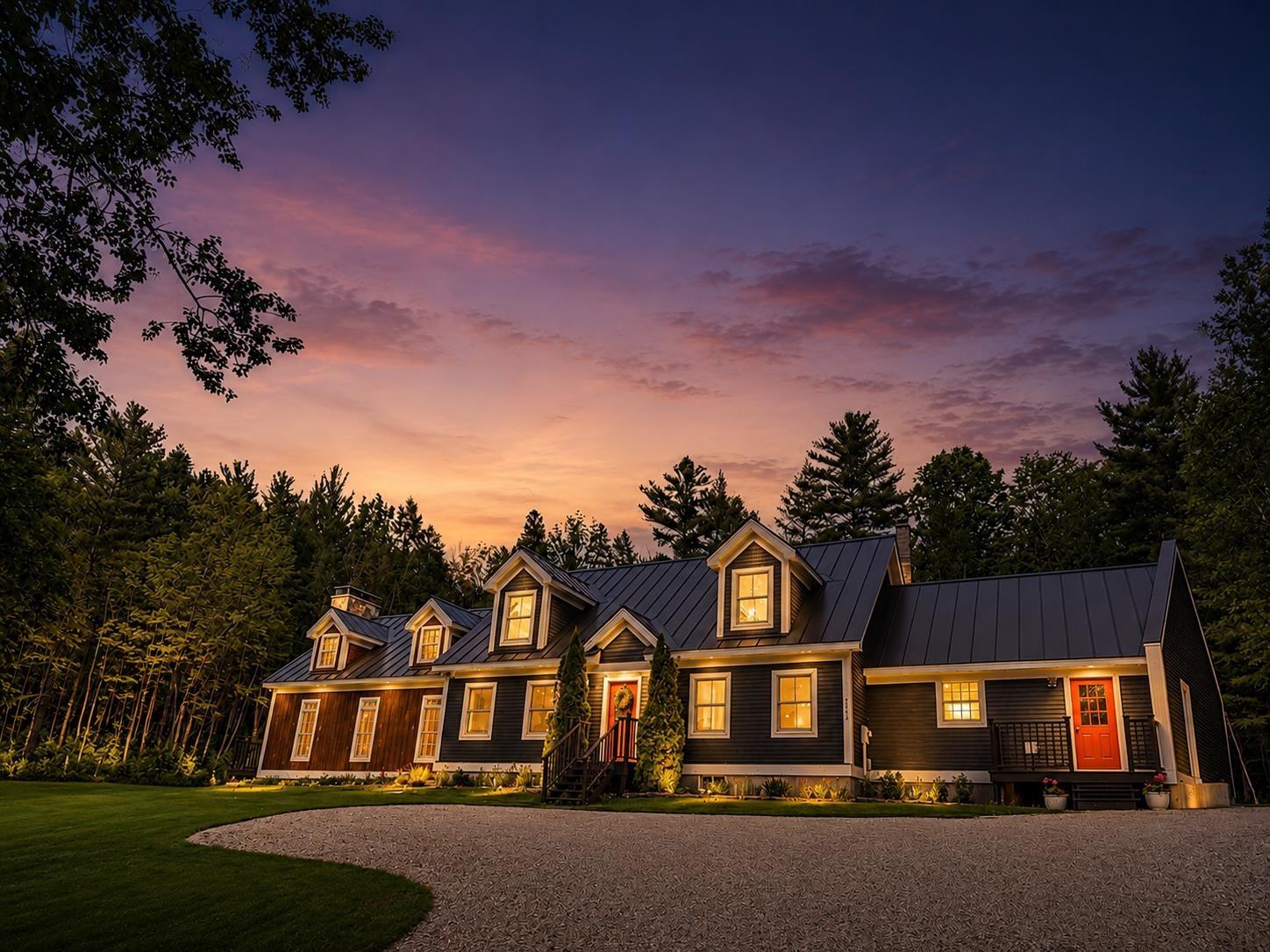 Image 1: Front of the House at Dusk