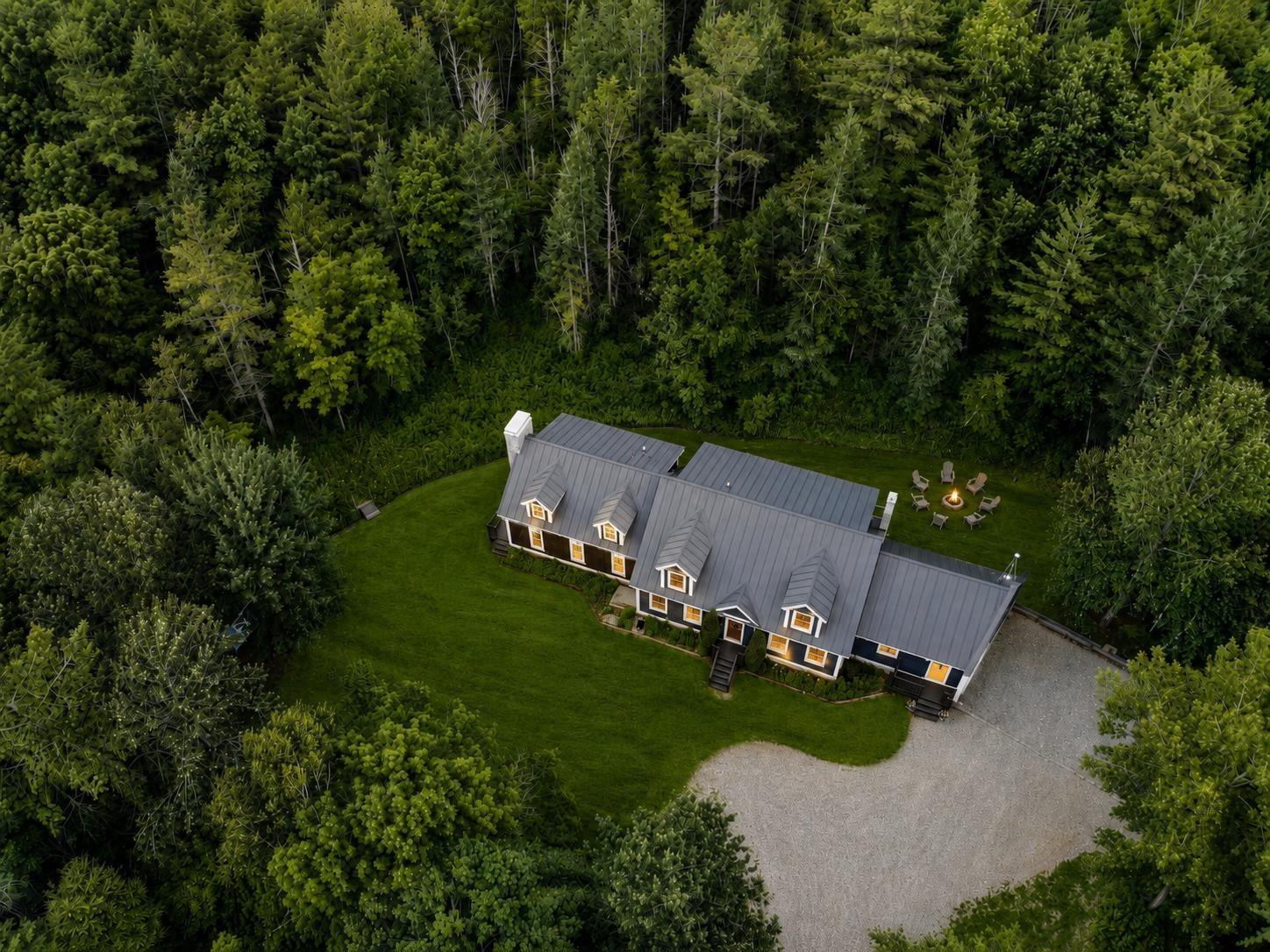 Image 2: Aerial of House, the 10+ acres not in view