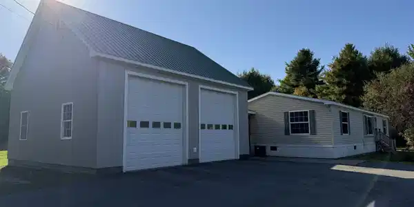Image 2: Oversized Garage and Paved Drive