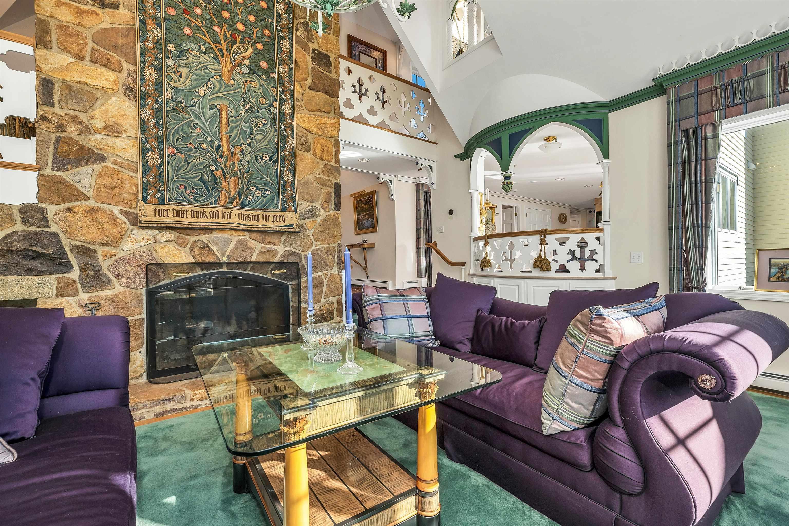 Image 3: Gather around the floor to ceiling fireplace