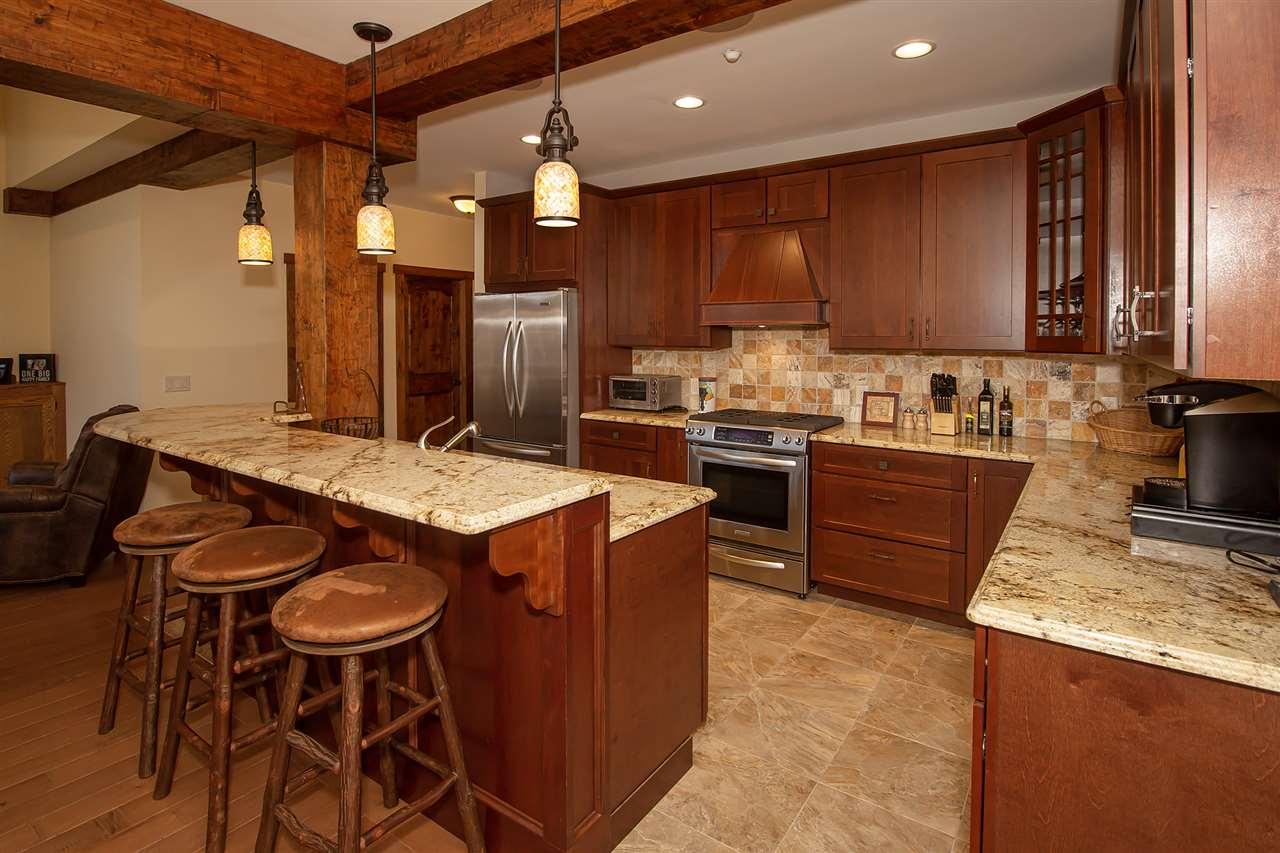 Image 1: Custom gourmet kitchen