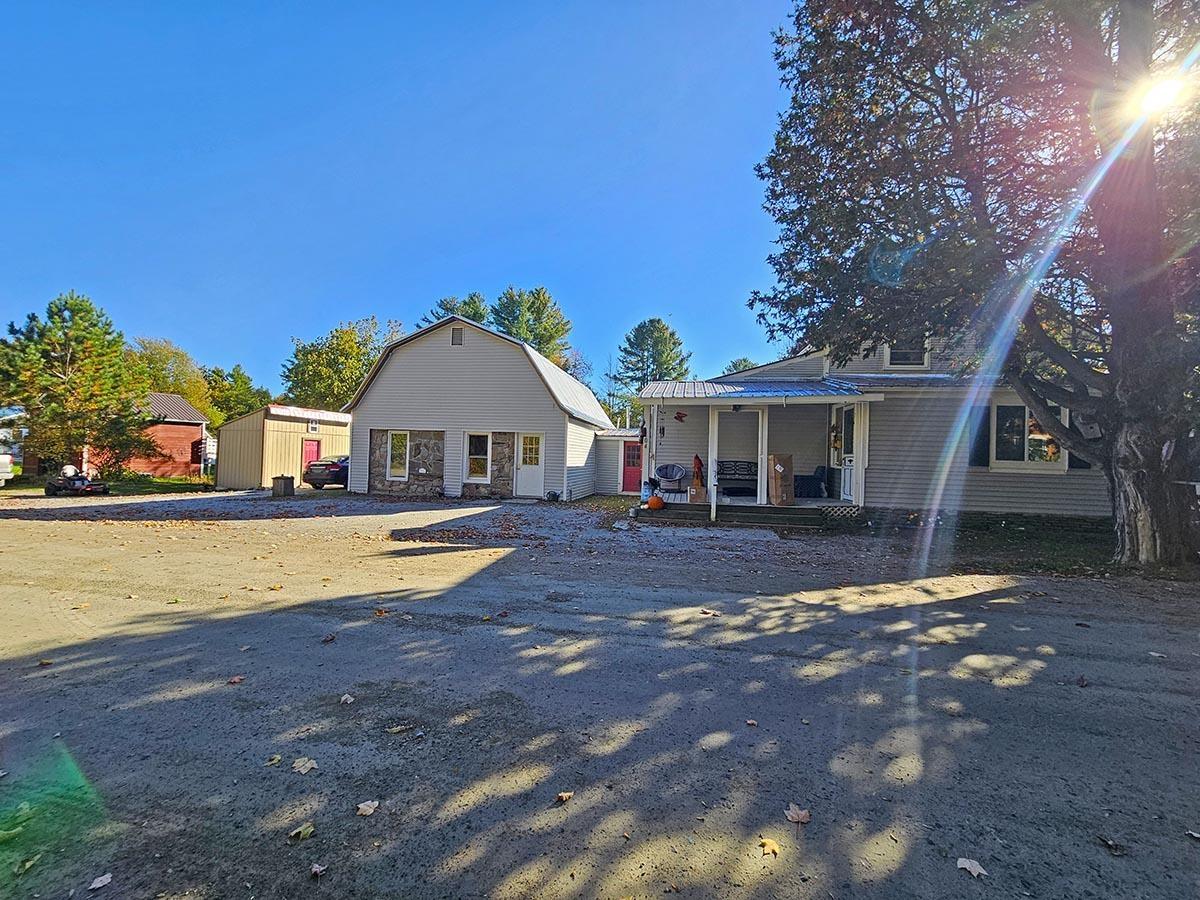 Image 3: Main Home, Apt Building, & 2-Story Garage