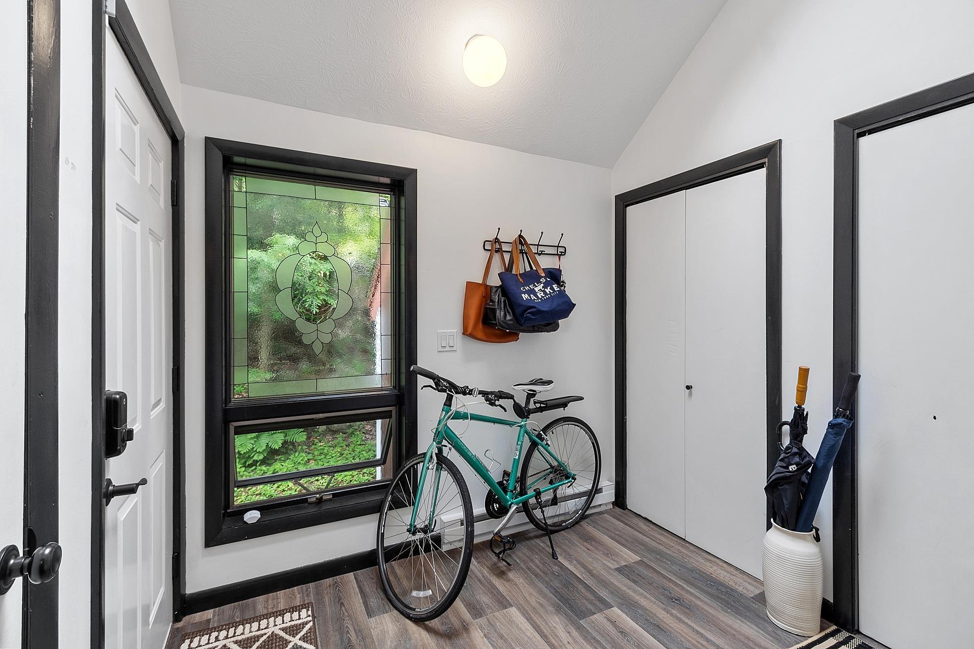 Image 1: Tiled floor, stained glass window, double closet, Mudroom