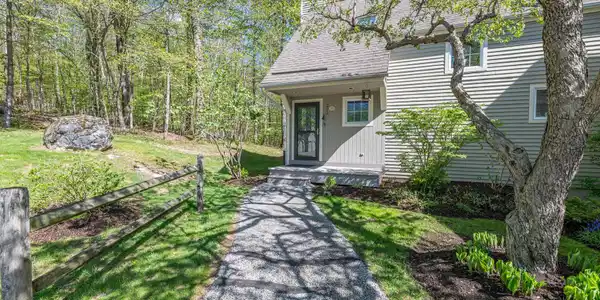 Image 4: paved walkway to front door