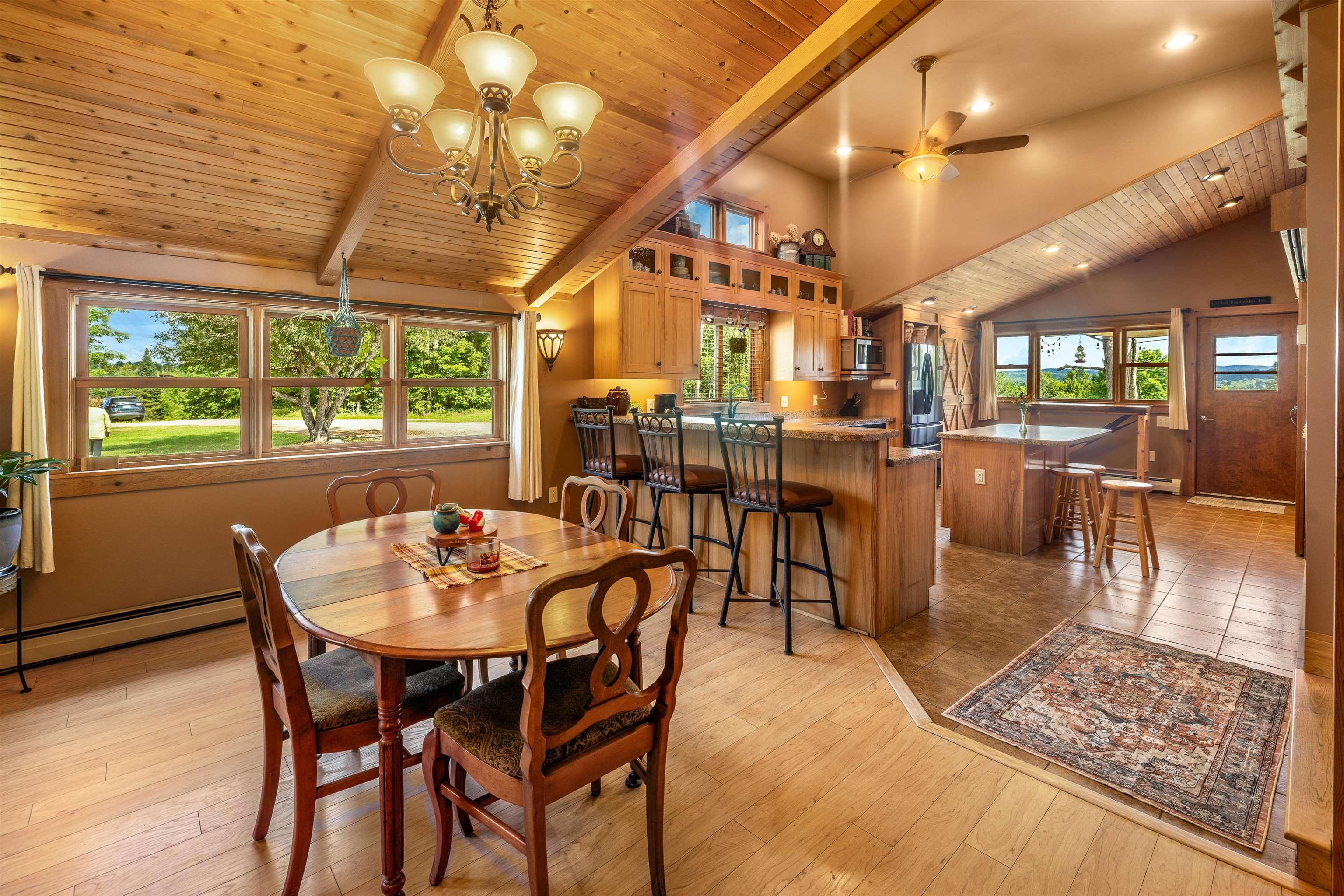 Image 3: Spacious kitchen and dining area