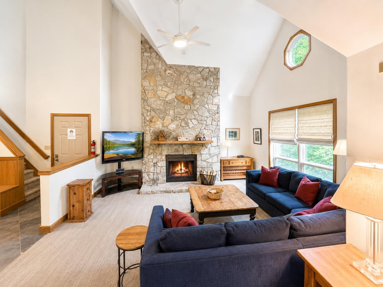 Image 2: Floor-to-ceiling Fieldstone fireplace Image 2: Floor-to-ceiling Fieldstone fireplace