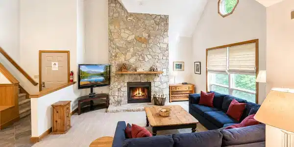 Image 2: Floor-to-ceiling Fieldstone fireplace