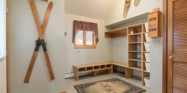 Image 2: Expanded mudroom with built ins