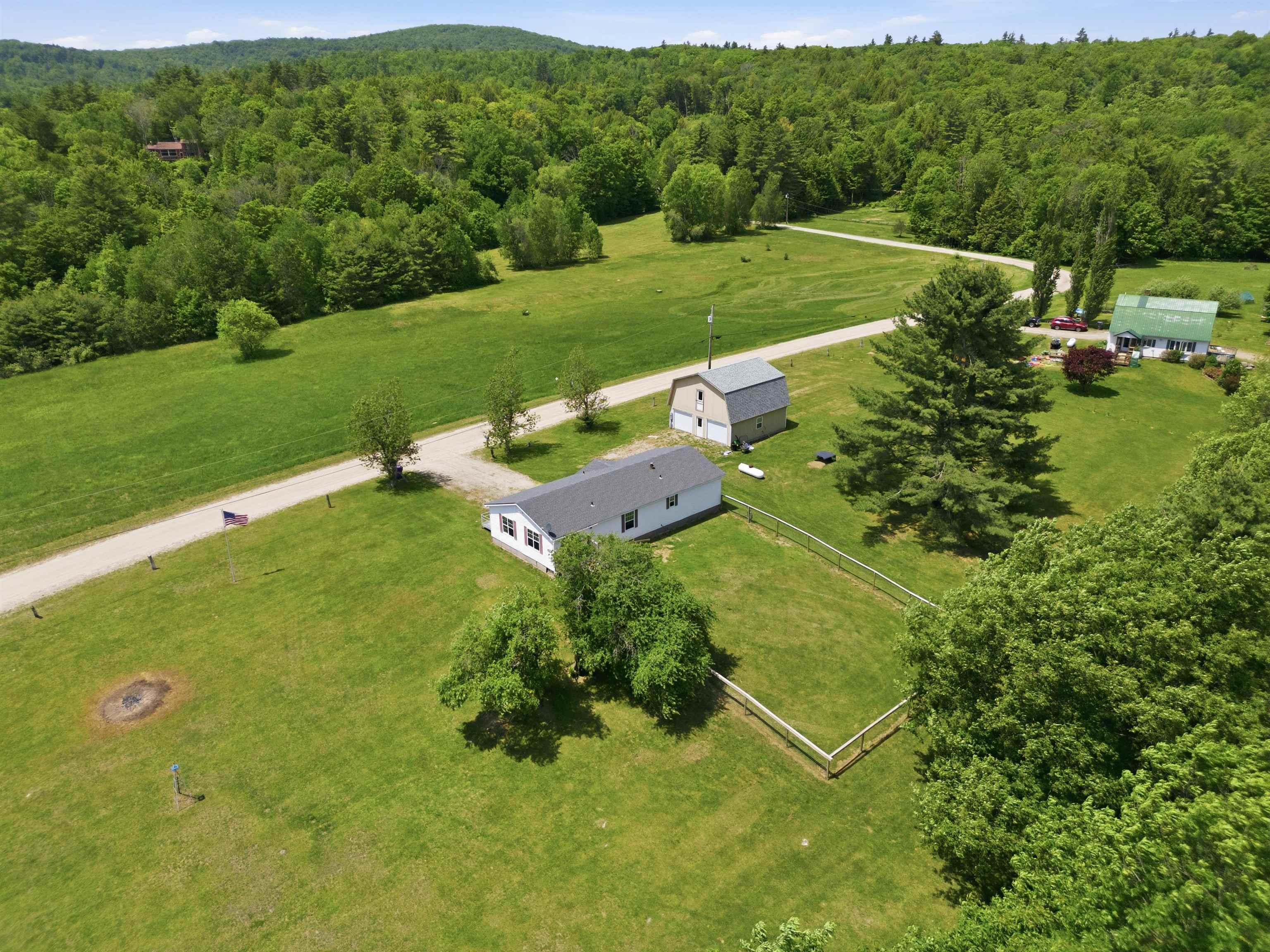 Image 4: The 2.8-acre lot directly across the street is part of this 