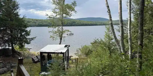 Image 2: Stairs Down to Screen porch, beach, & dock
