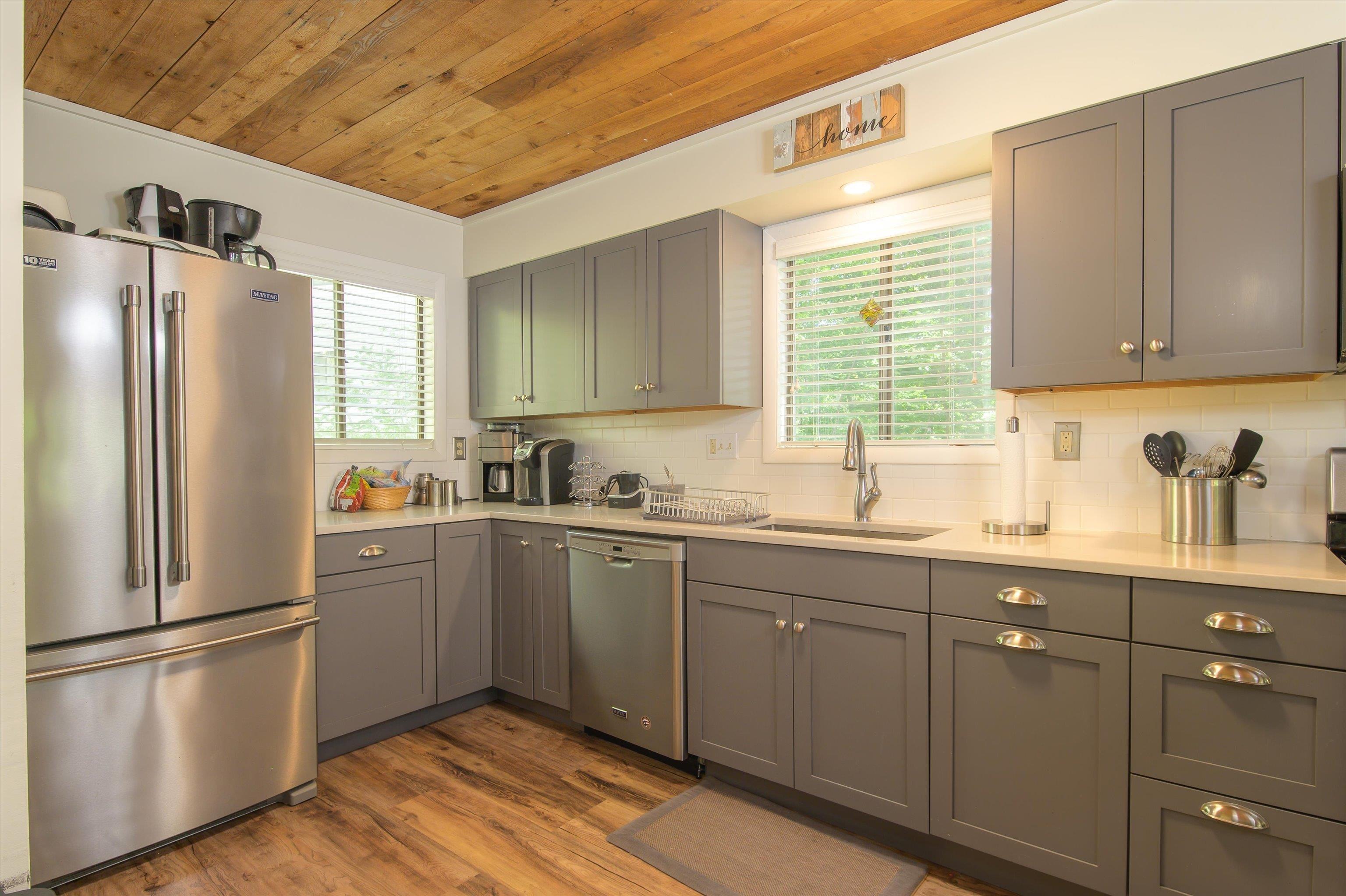 Image 2: Updated kitchen highlighted by wood ceiling Image 2: Updated kitchen highlighted by wood ceiling