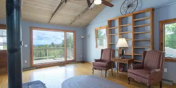 Image 4: Cozy sitting area with wood burning stove...