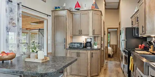 Image 4: Living room flows to kitchen