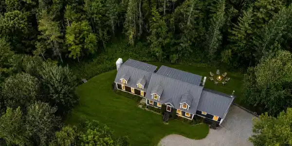Image 2: Aerial of House, the 10+ acres not in view