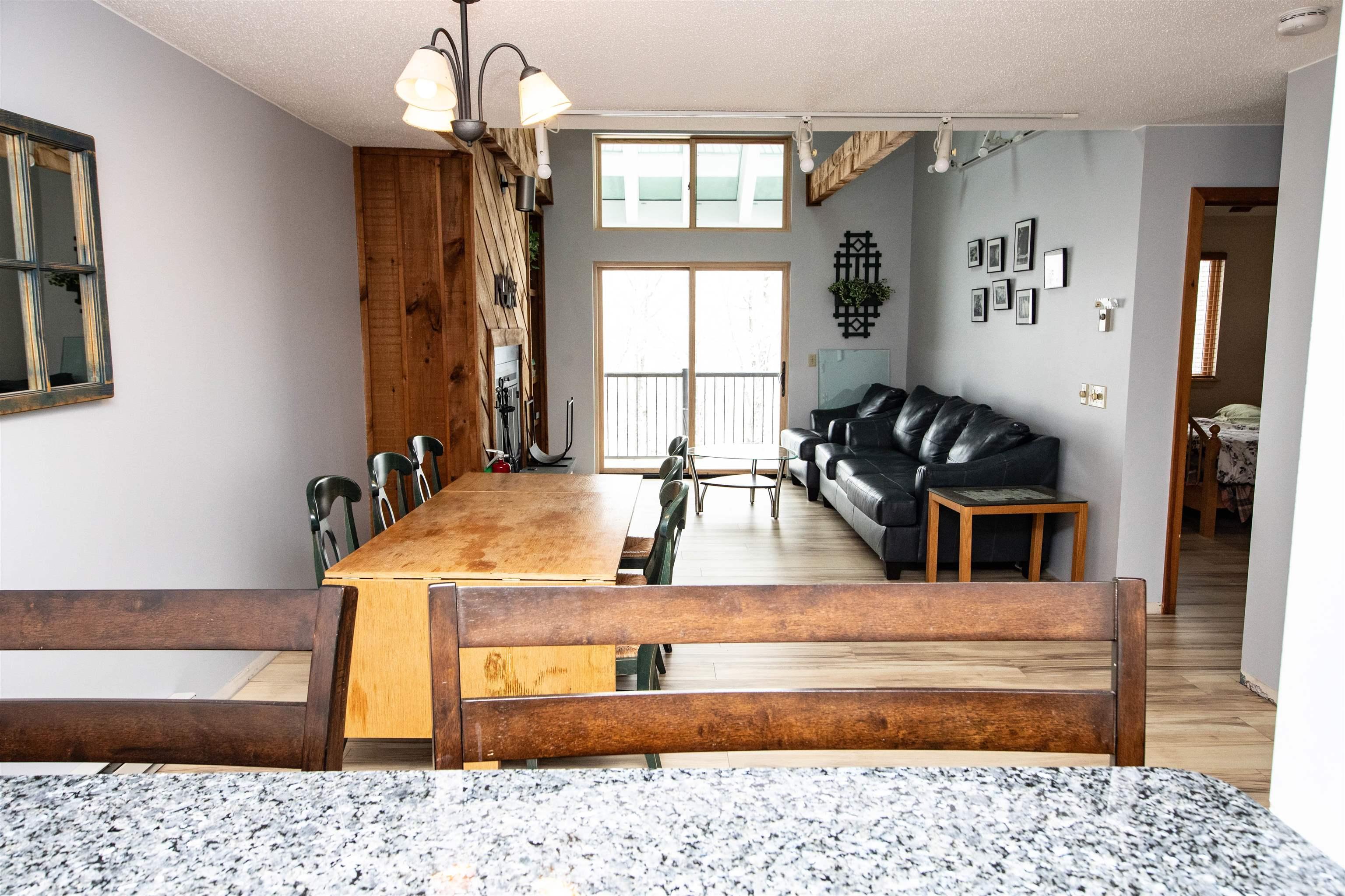 Image 4: Kitchen, Dining and Living Room with Sliders to Deck