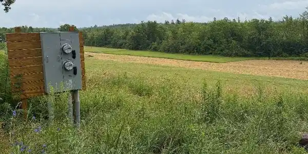 Image 2: late July Lot 3 with field mowed