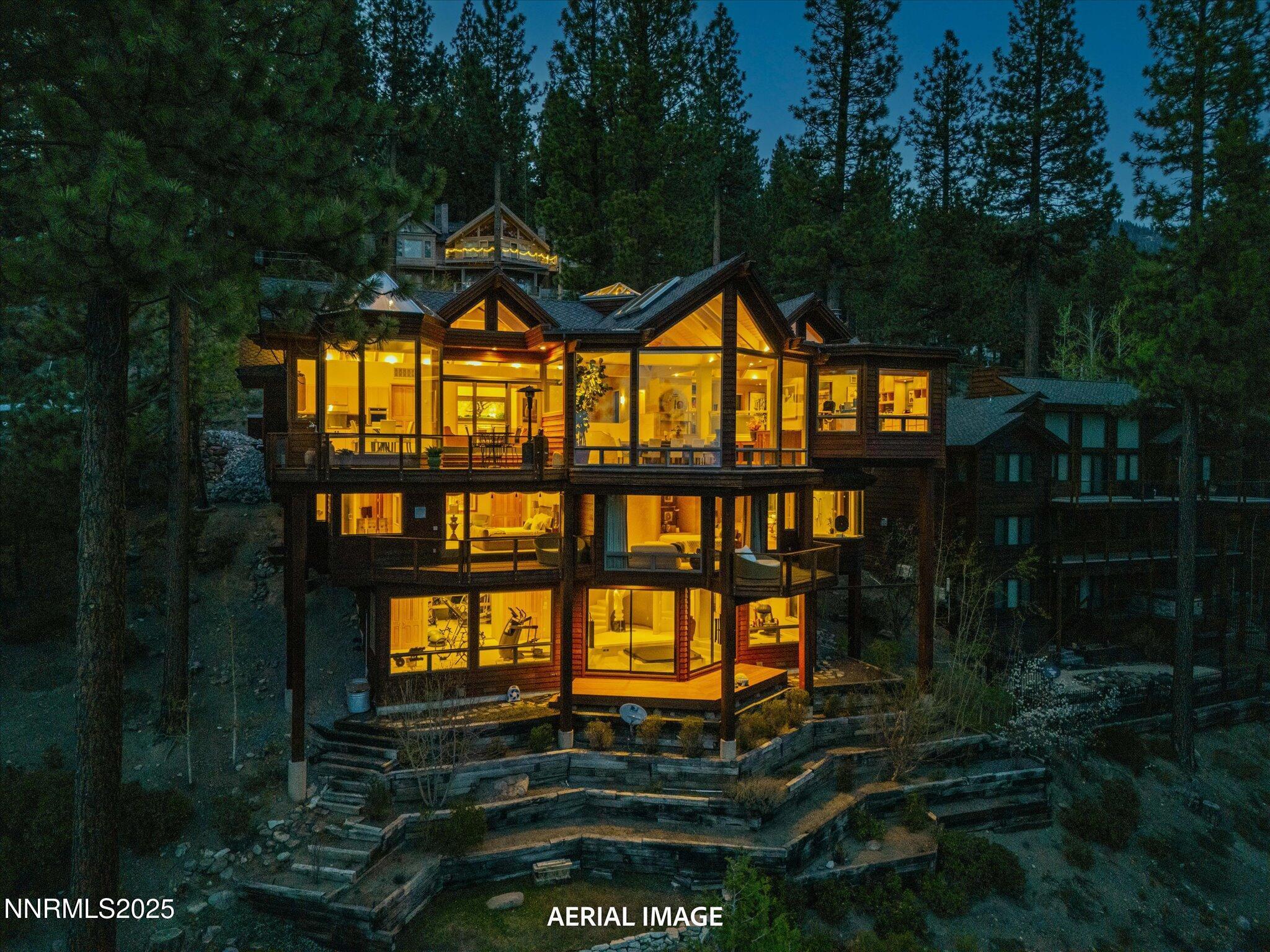 Image 2: 167-Twilight Aerial back of house