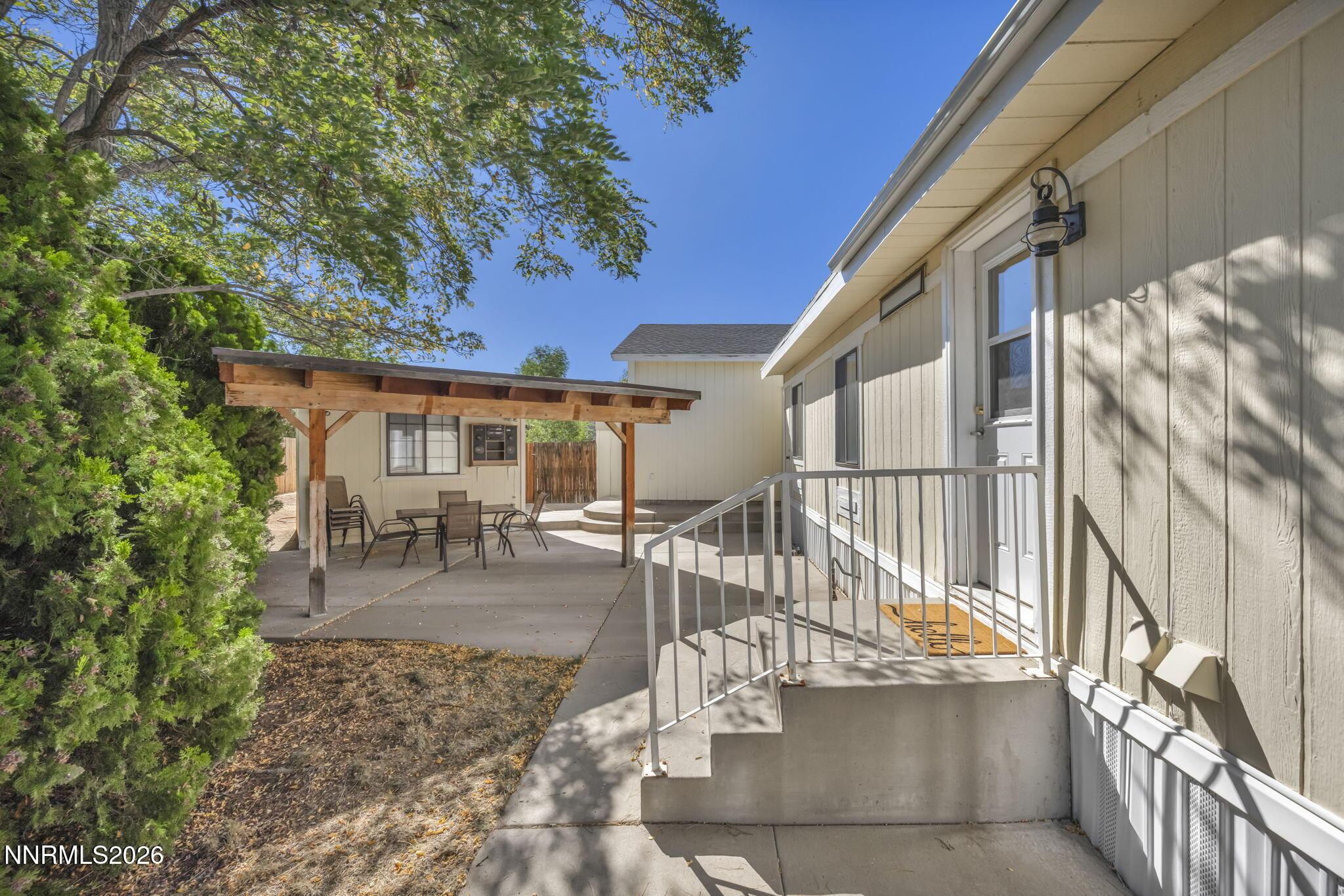 Image 3: Back Door and Patio