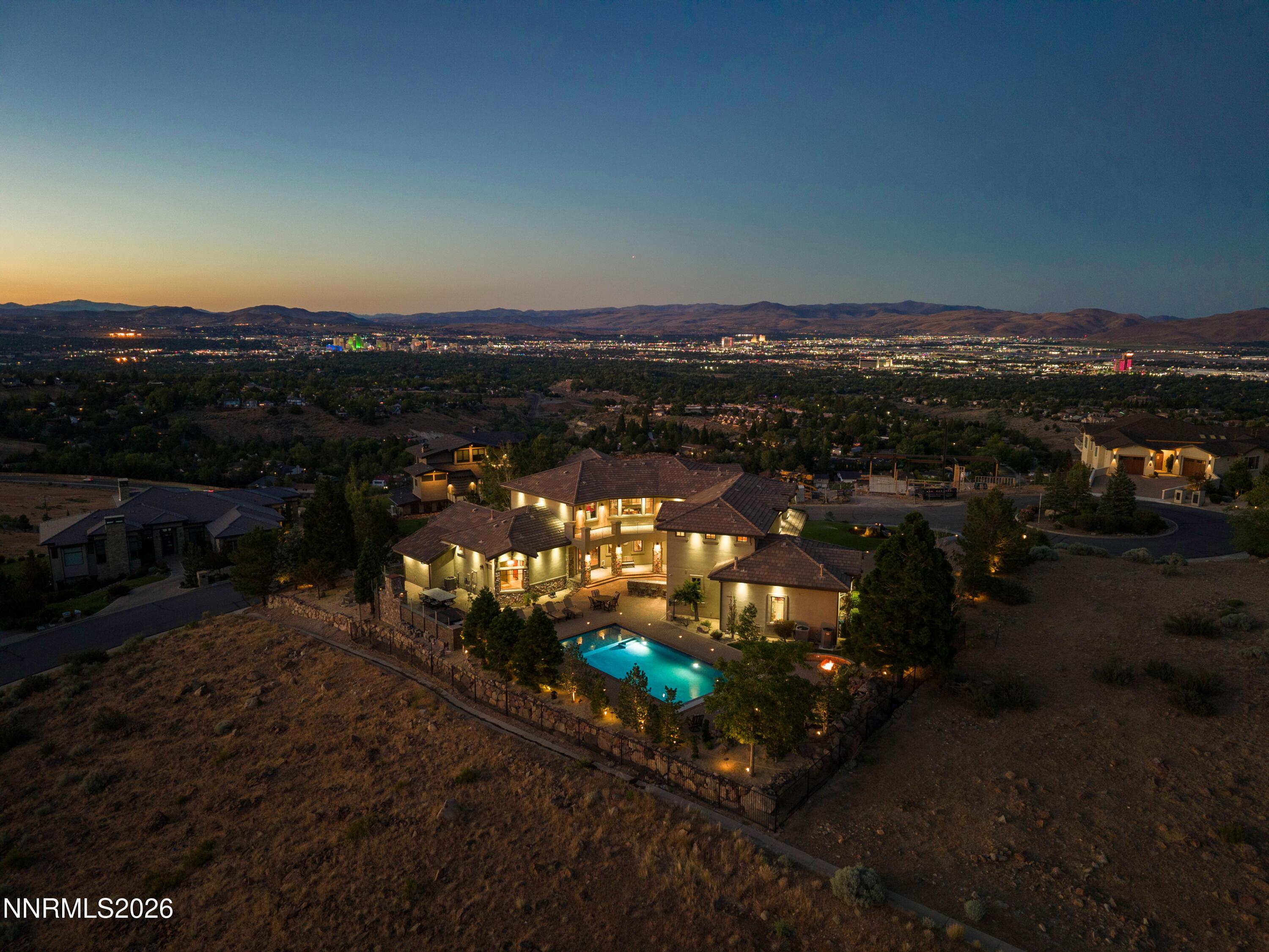 Image 1: 137-4816 Piney Woods Ct-Aerial Twilights