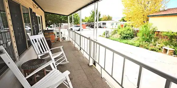 Image 2: meggs bryan front porch
