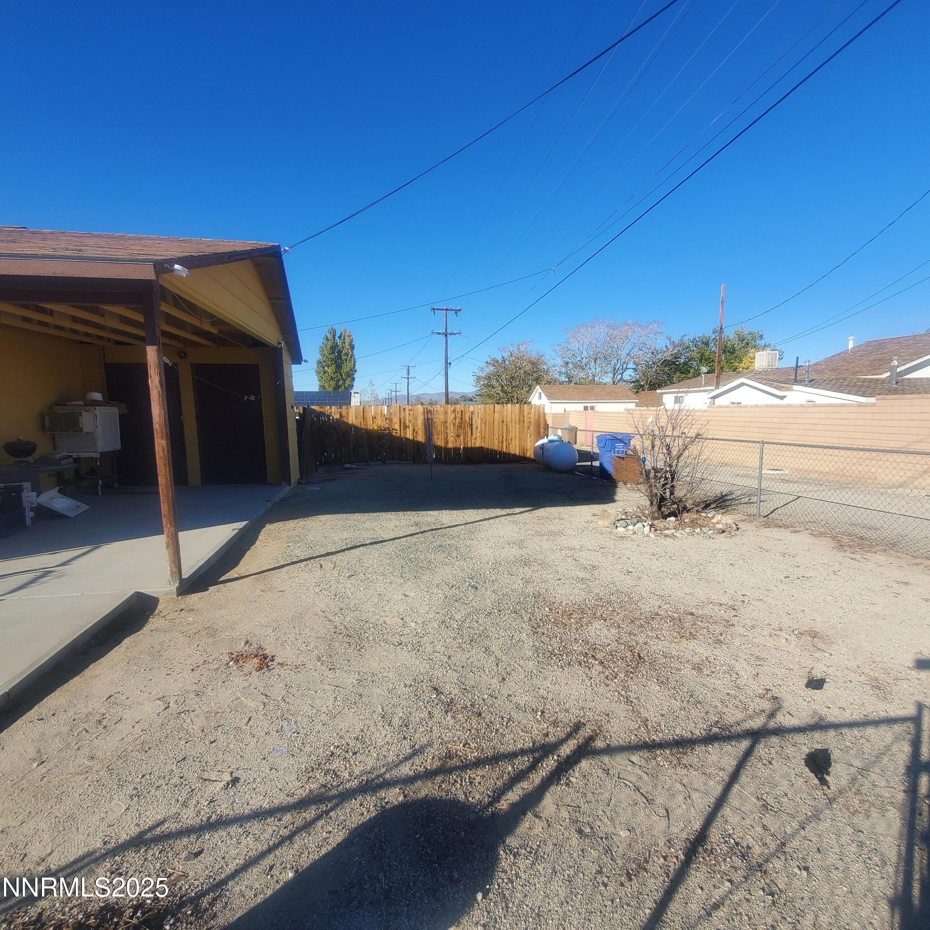 Image 4: 104 F st side yard parking