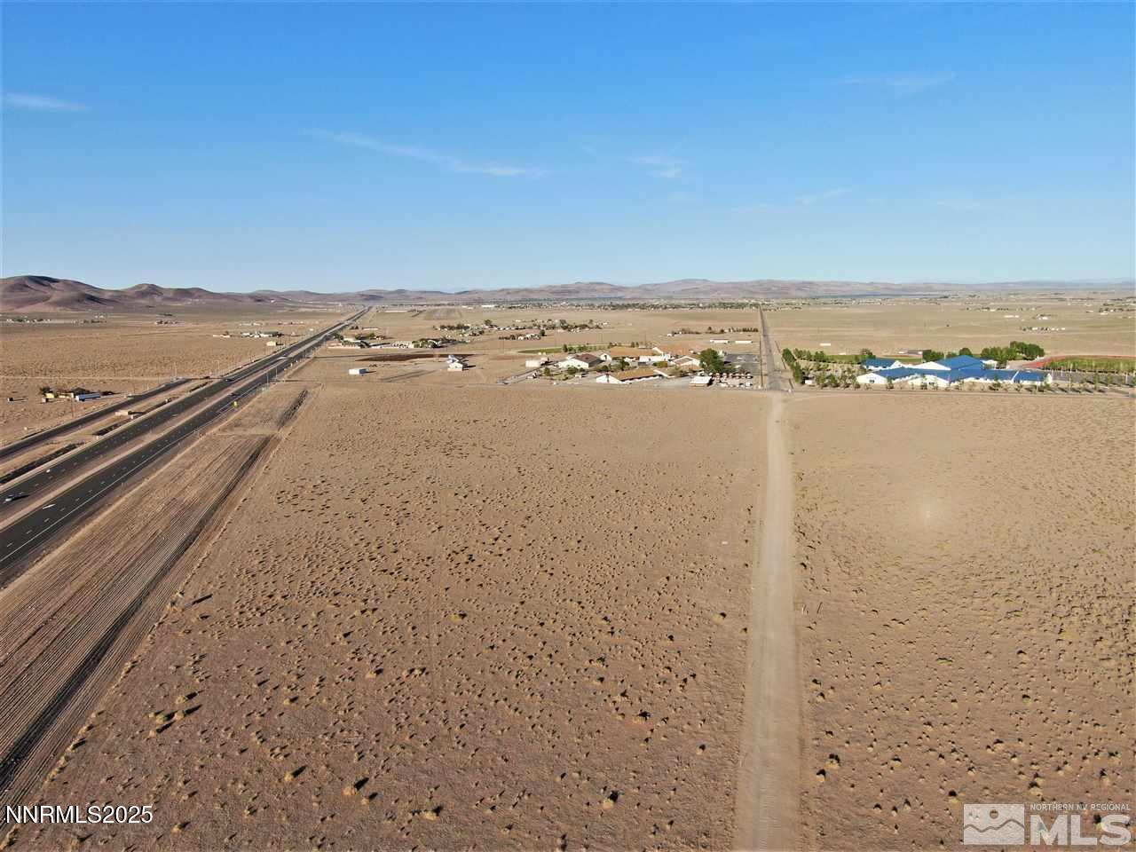Image 3: Spruce - drone view W from lot to school