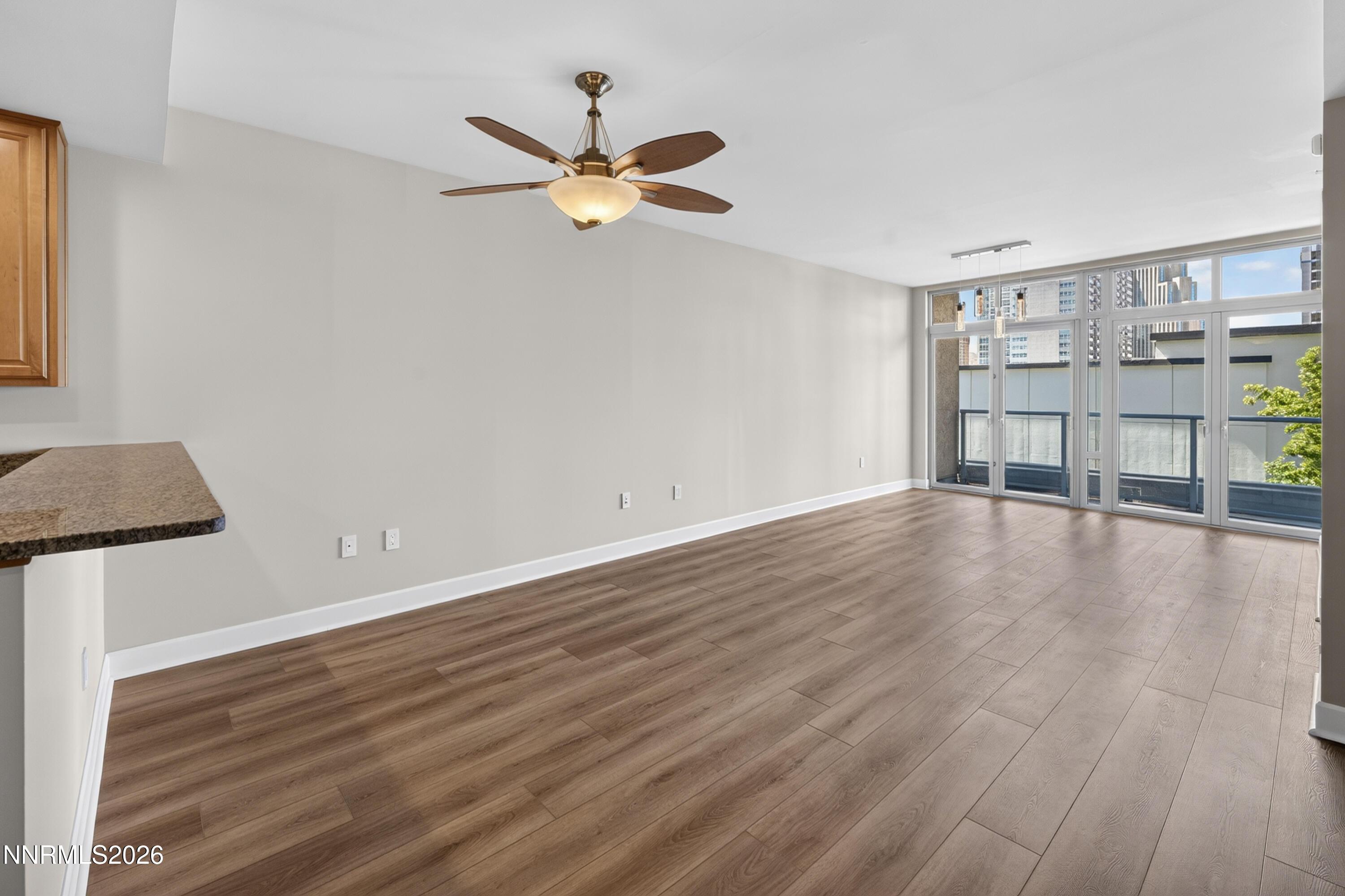 Image 3: Bright great room with balcony