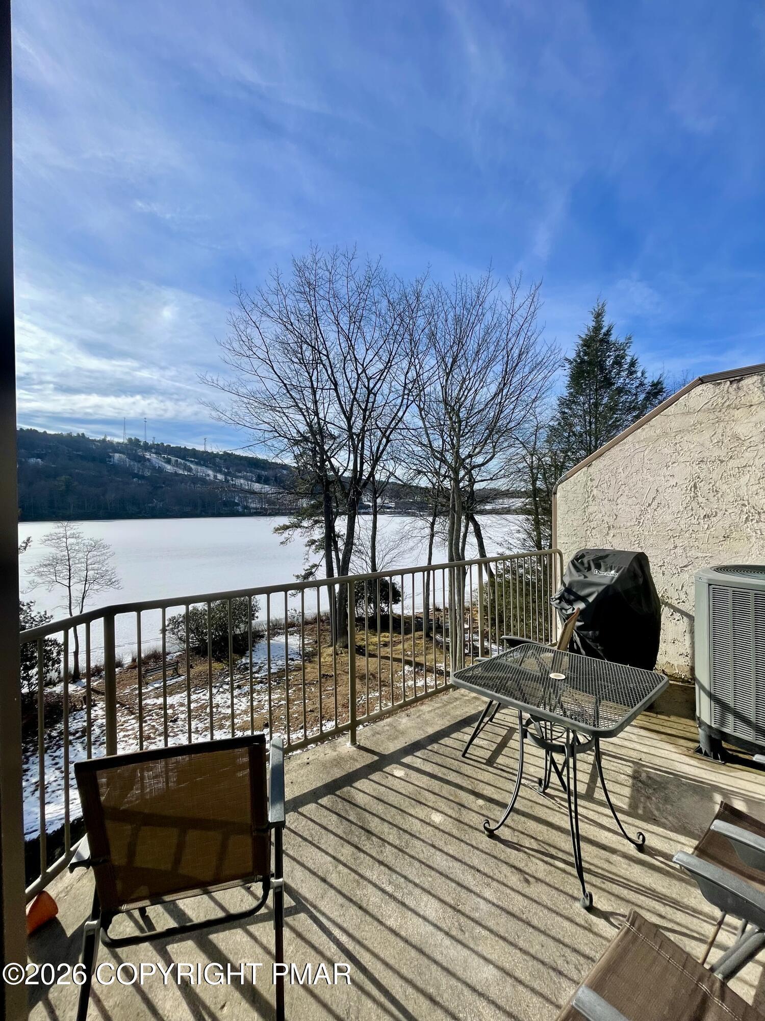 Image 3: winter balcony view from unit