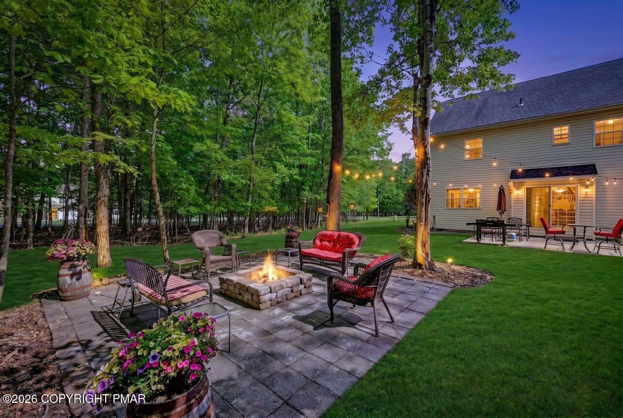 Image 2: Backyard Patio w/ Custom Fire Pit