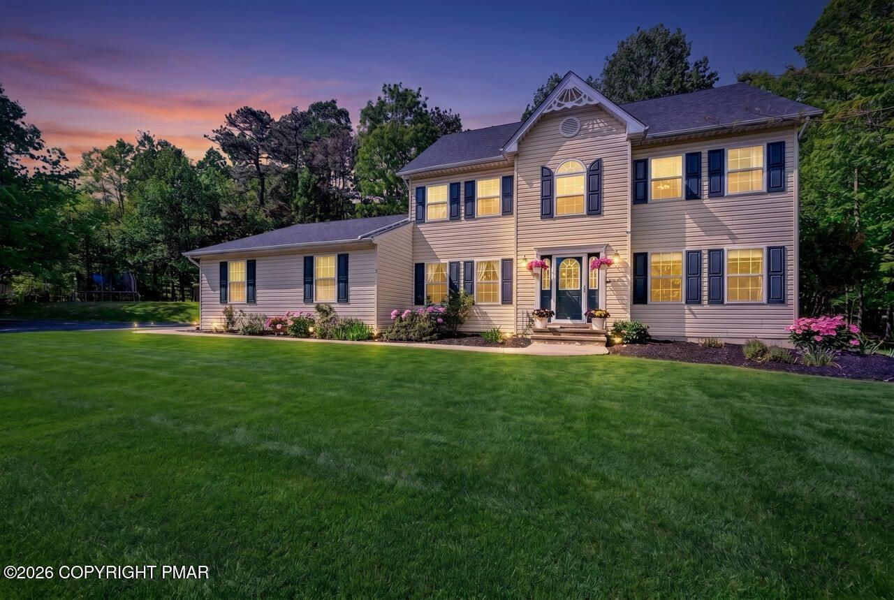 Image 3: Dusk Colonial View on Corner Lot