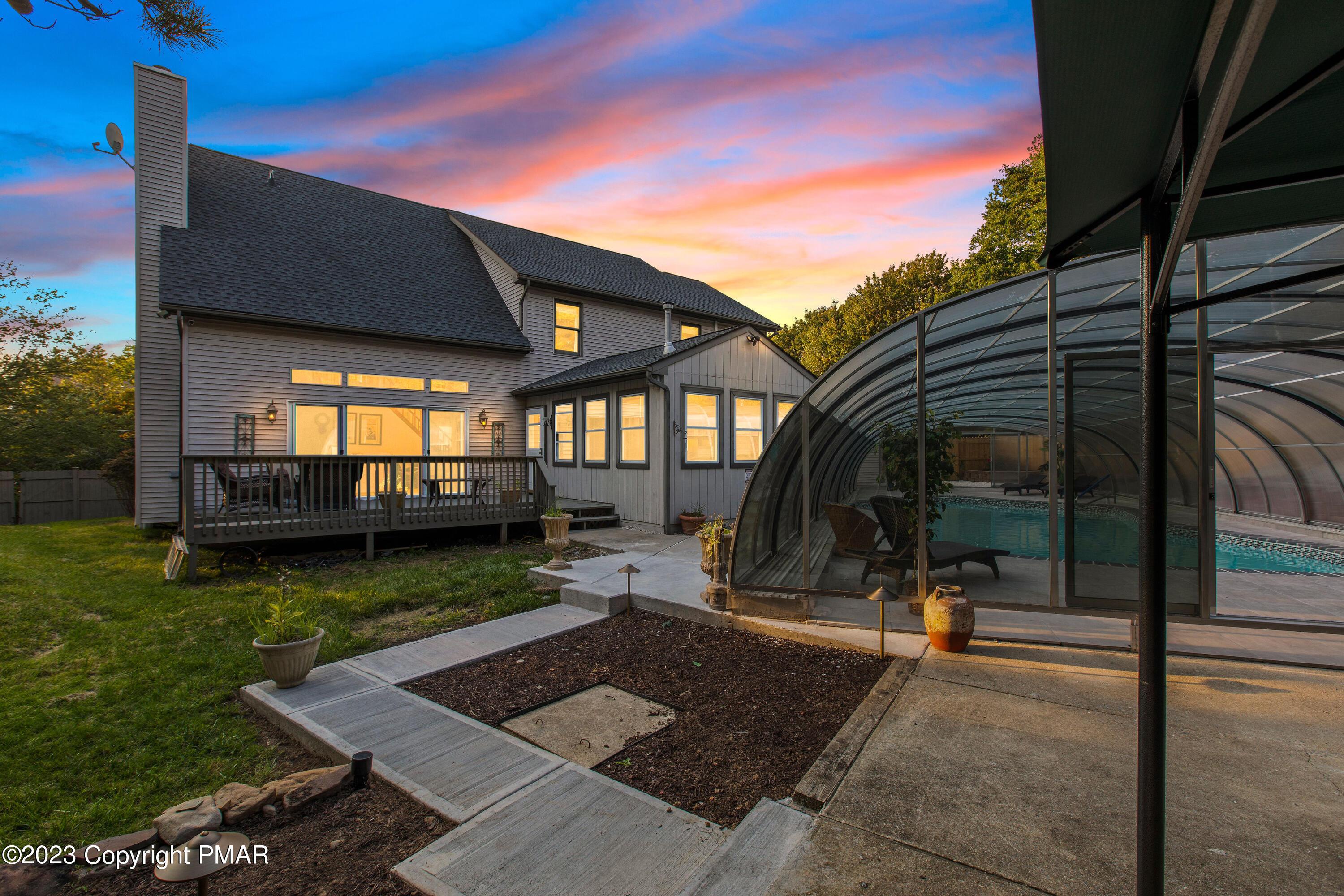 Image 3: Rear Dusk & Pool View