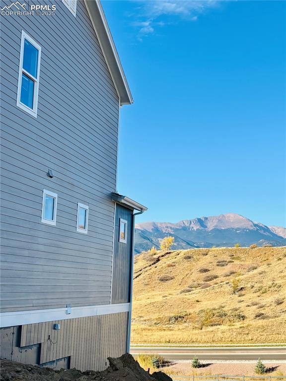 Image 4: View of property exterior featuring a mountain view