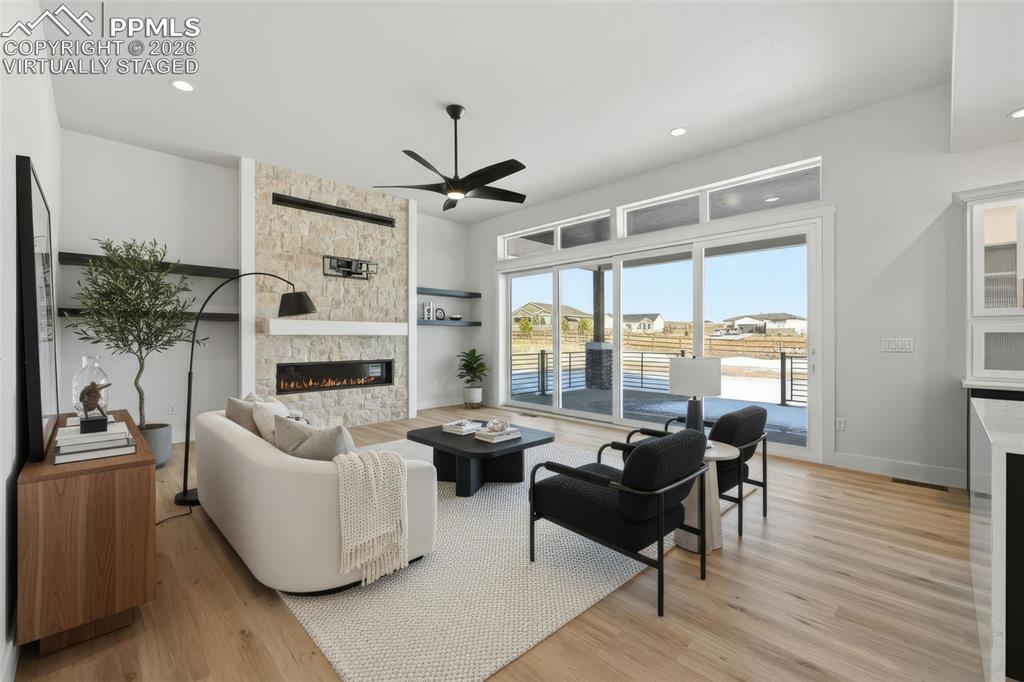 Image 4: Warm cozy fire place Virtually staged