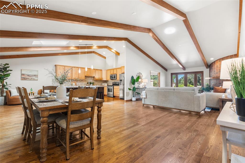 Image 4: Soaring Beamed Ceilings With An Open Concept Floorplan