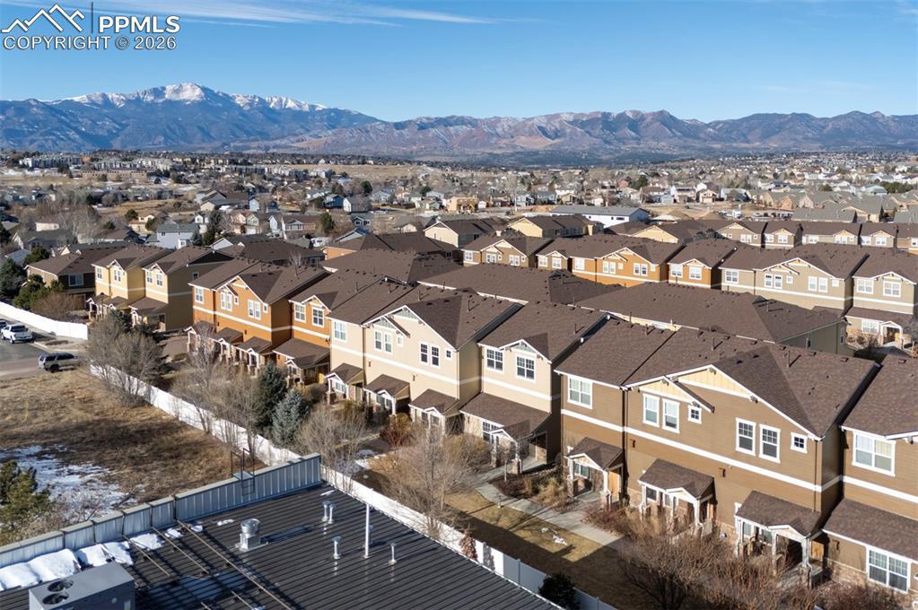 Image 3: Mountain views from inside the home and balcony.