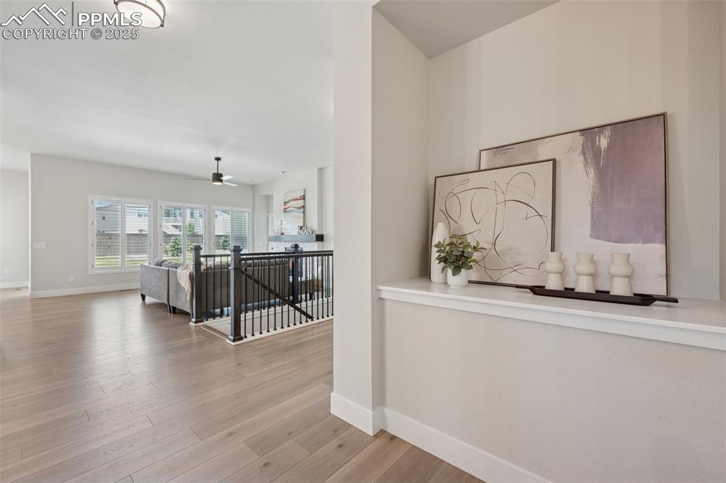 Image 4: Welcoming entry and beautiful plank flooring in the main living areas!