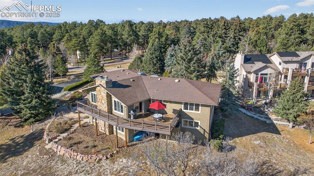 Image 1: Huge composite deck and stone fireplace!